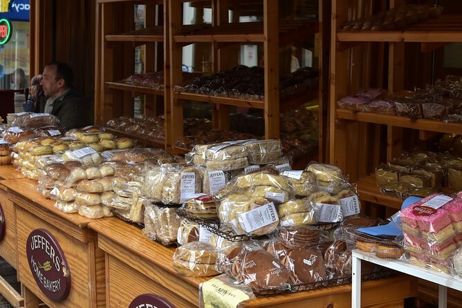 Belfast Centre Food Tour of 12+ Local Irish Dishes & Drinks - Guinness, craft beer, tea, and hot chocolate