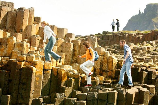 Giant's Causeway and more including Titanic Experience Ticket Tour from Belfast - Why this day works: city engineering, coast, and legend