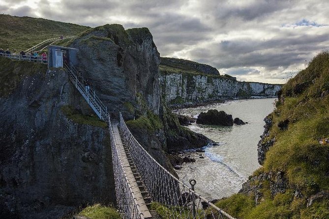 Giant’s Causeway and Titanic Experience from Belfast Port - Dunluce Castle, a five-minute coastal photo stop