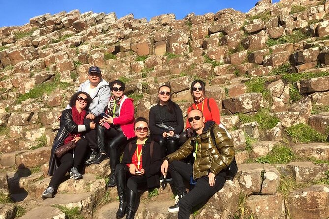 Giants Causeway & Antrim Coast Private Tour - Dunluce Castle on the cliff edge