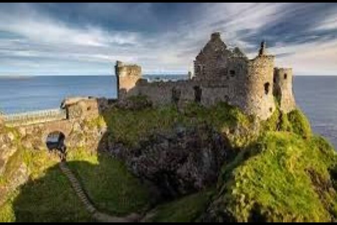Giants Causeway Tour From Belfast including Game of thrones sites - Dunluce Castle above the coast