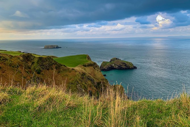 Northern Highlights Full-Day Guided Tour in Northern Ireland - Portaneevy, the rope bridge, and Scotland across the water