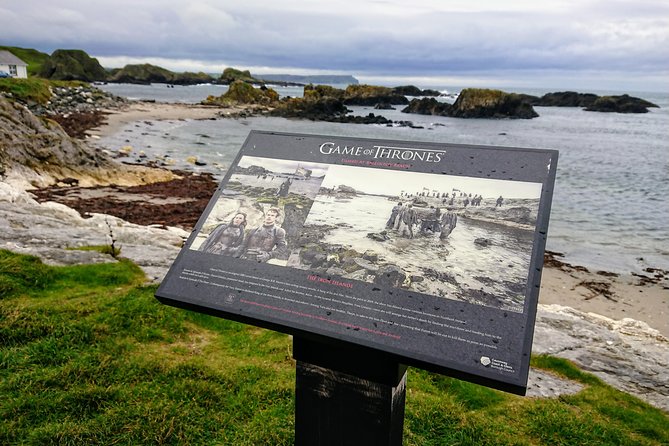 Private Game of Thrones Filming Locations Tour From Belfast - Dunluce Castle above the sea